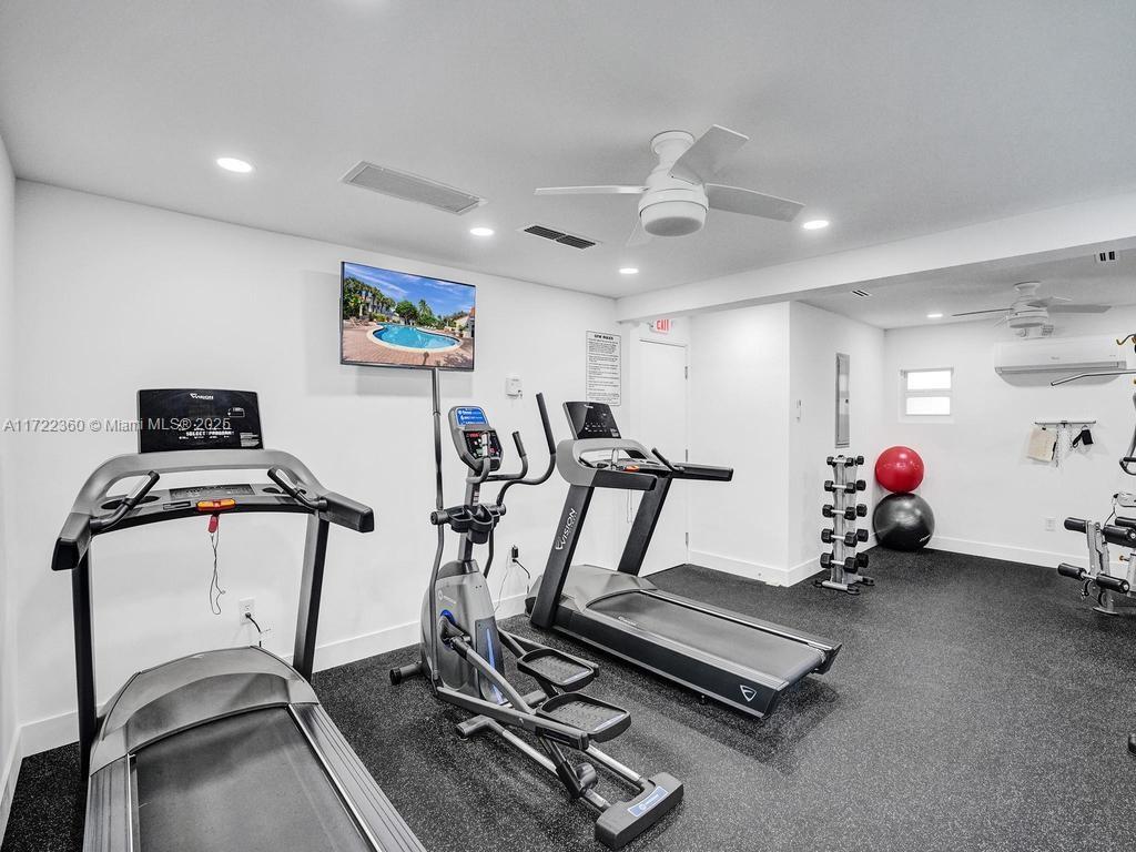 8850 Southwest 67th Court Pinecrest, FL 33156 - Photo 42 of 49 a view of a room with gym equipment