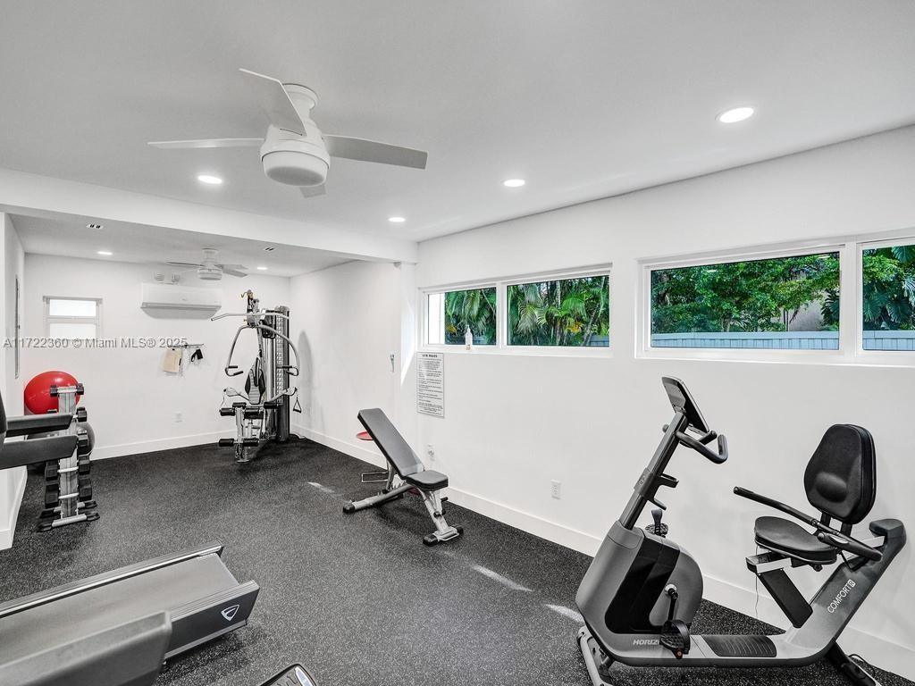 8850 Southwest 67th Court Pinecrest, FL 33156 - Photo 43 of 49 a view of a room with gym equipment