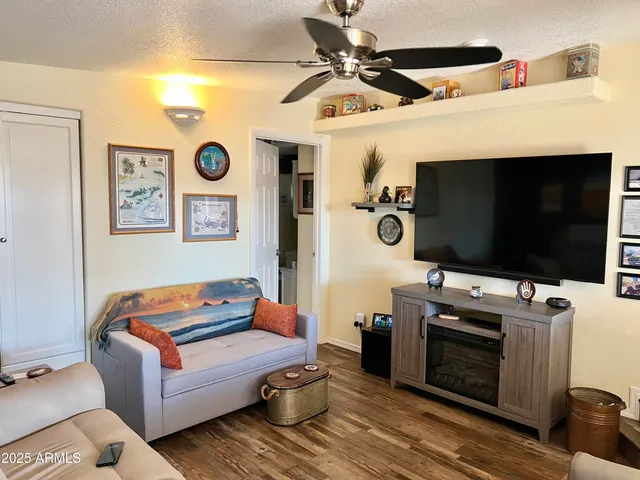 a living room with furniture and a window