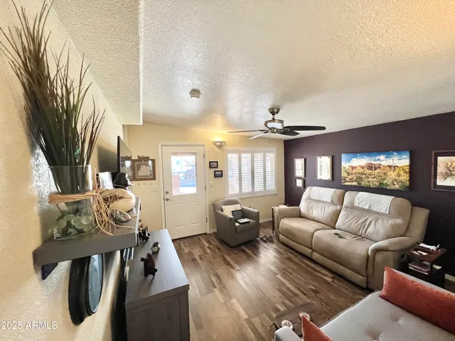 a bathroom with a sink vanity mirror and toilet