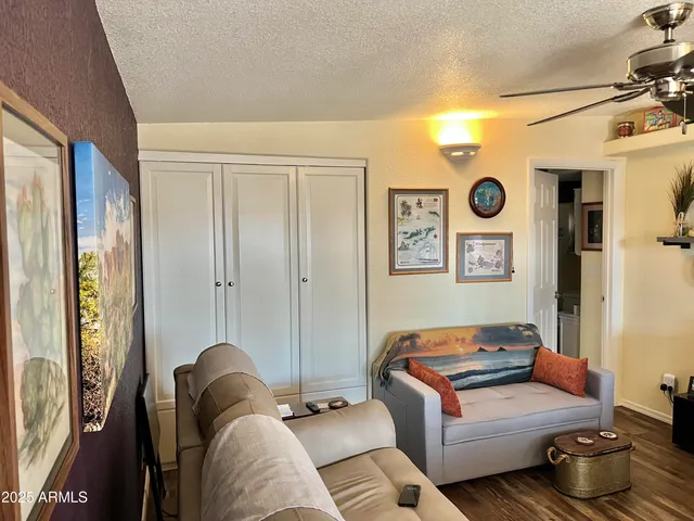 a bathroom with a sink toilet and mirror