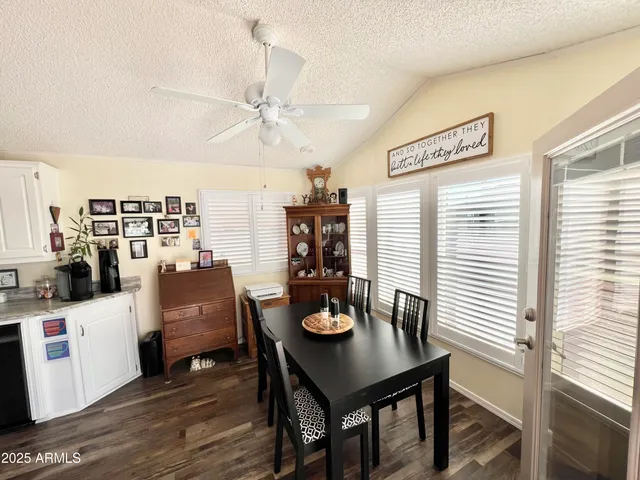 a kitchen with a stove microwave and sink
