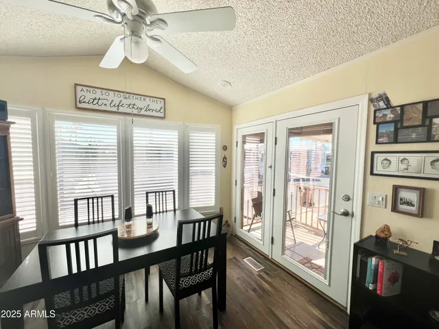a kitchen with stainless steel appliances granite countertop a sink and cabinets