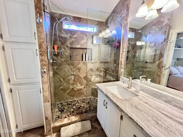 a view of a patio with couches and dinning table and chairs