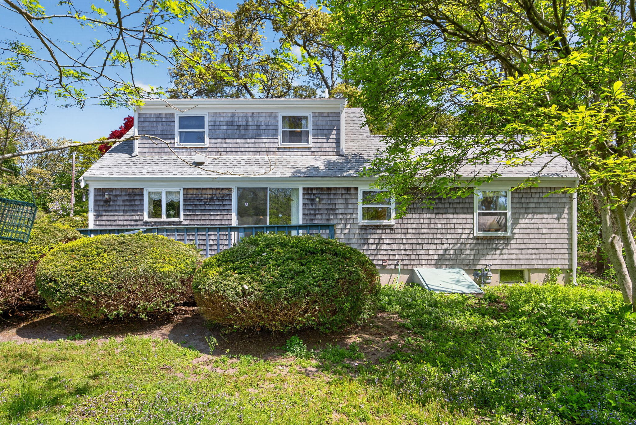 23 Nickerson Road Orleans, MA 02653 - Photo 29 of 54 a view of a house with a garden