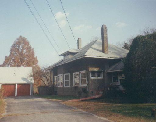 288 Kent Road New Milford, CT 06776 - Photo 1 of 1 a front view of a house with a yard