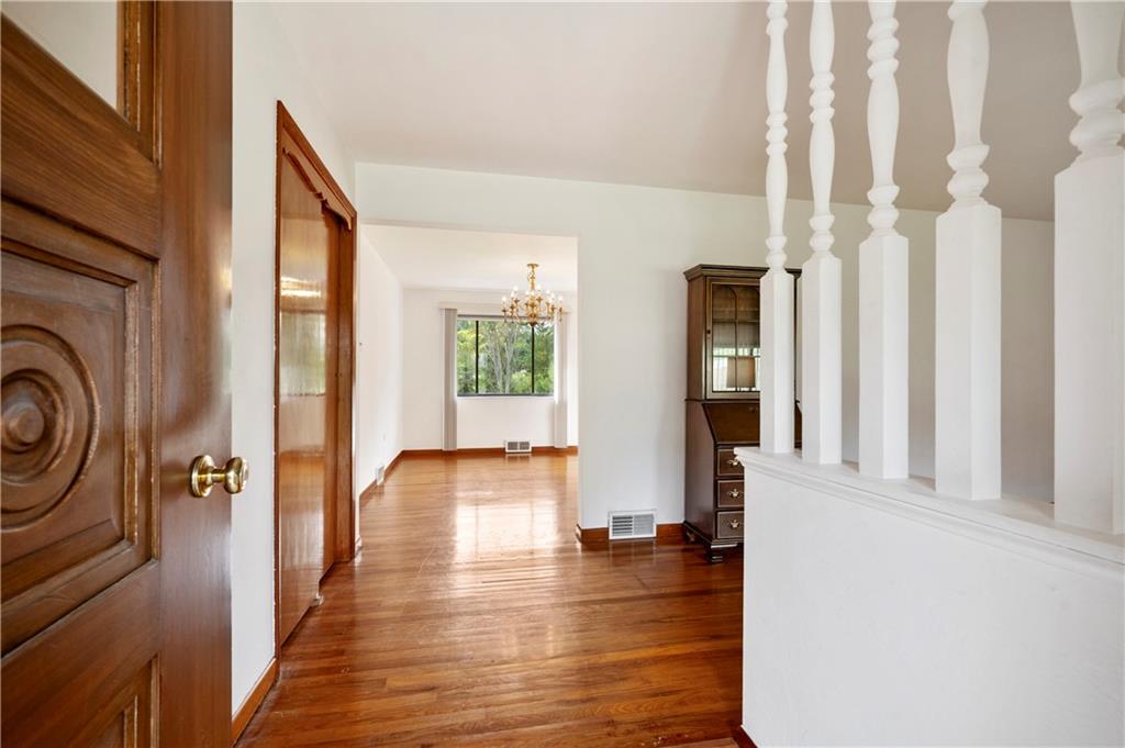 5535 Glass Road Pittsburgh, PA 15205 - Photo 3 of 23 The entry offers a solid front door and hardwood floors.