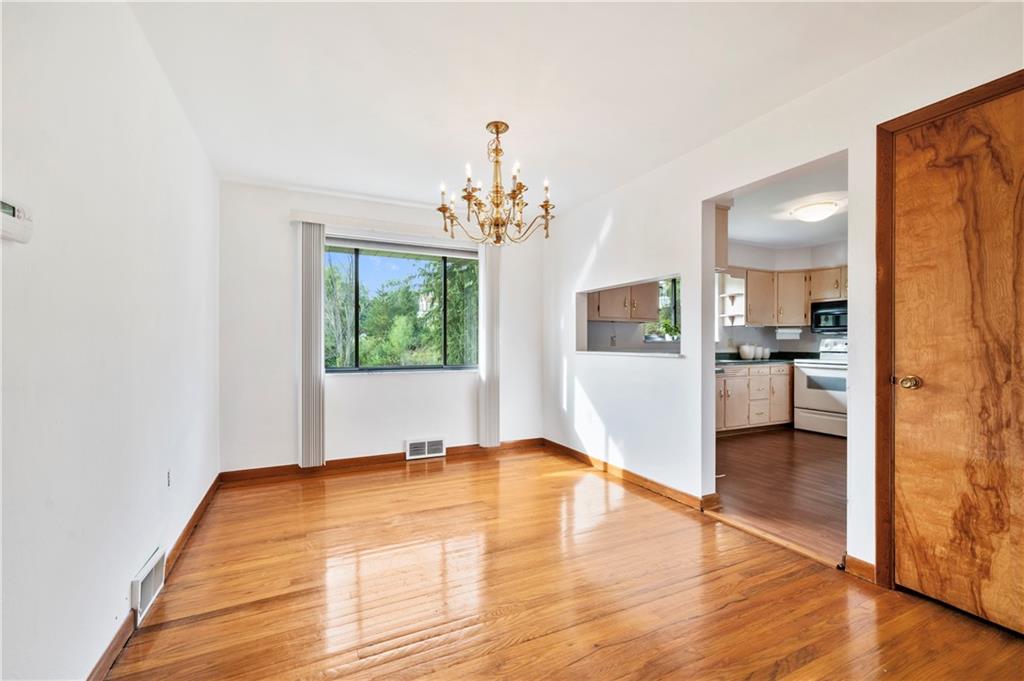 5535 Glass Road Pittsburgh, PA 15205 - Photo 6 of 23 The dining room offers hardwood floors and a large window that allows for plenty of natural light.