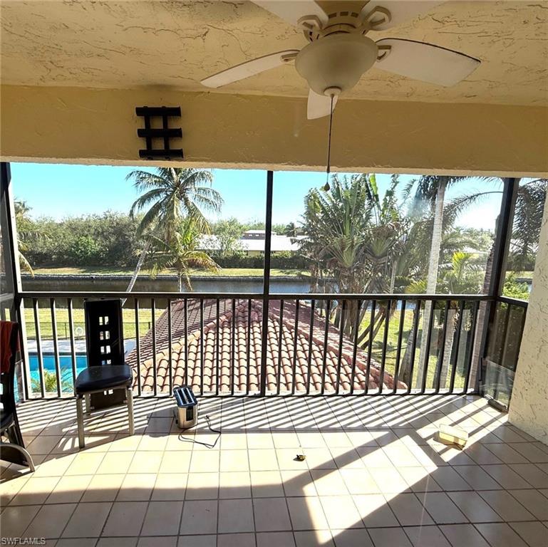 700 Valley Stream Drive, Unit 303 Naples, FL 34113 - Photo 5 of 9 a view of balcony with a potted plant