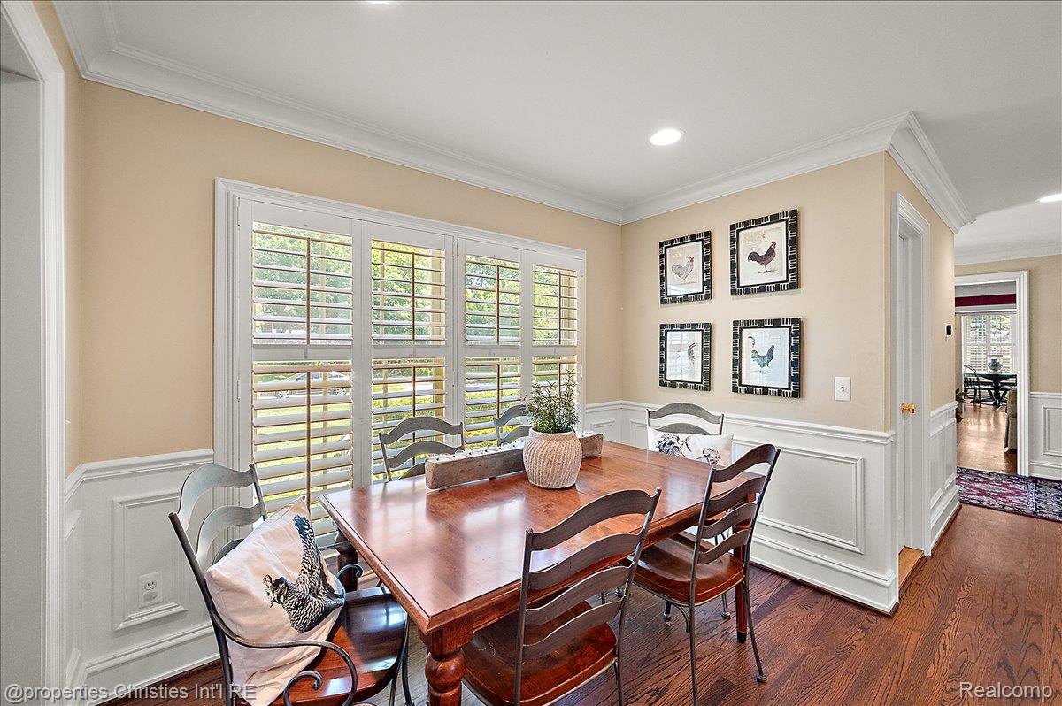 135 Clifton Road Bloomfield Hills, MI 48301 - Photo 25 of 77 Interior space featuring wood-finish flooring, white wainscoting, crown molding, recessed lighting, and plantation shutters