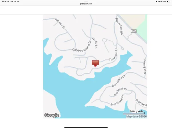 a picture of a room with a white wall and a painting