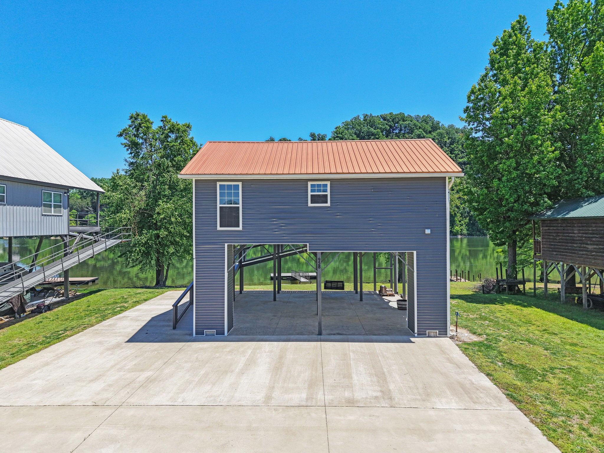 958 Pevahouse Camp Lane Decaturville, TN 38329 - Photo 31 of 32 a view of brick house with a yard