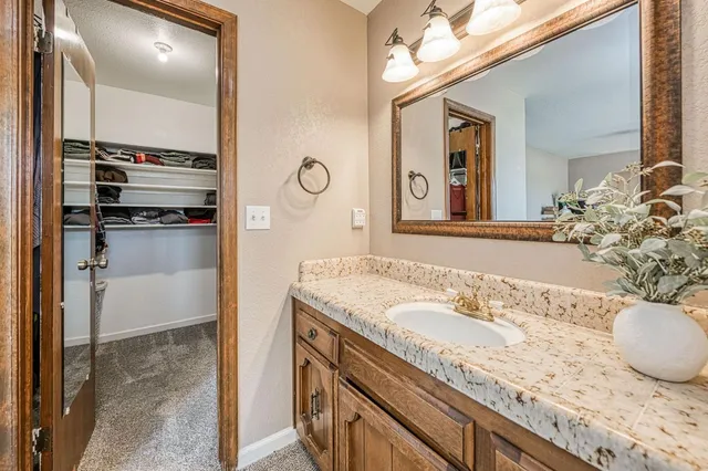 a bathroom with a shower and a toilet