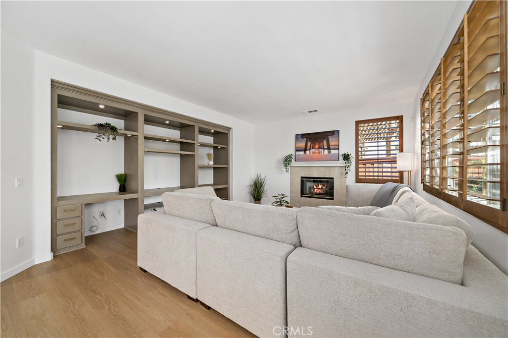 33307 Decada Street Temecula, CA 92592 - Photo 12 of 35 a living room with furniture and a fireplace