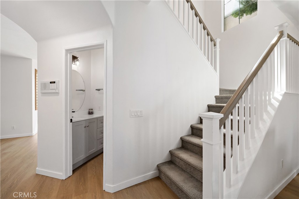 33307 Decada Street Temecula, CA 92592 - Photo 17 of 35 a view of staircase with wooden floor and staircase