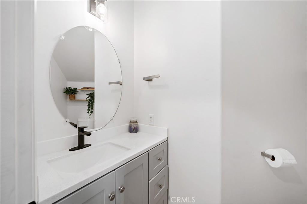 33307 Decada Street Temecula, CA 92592 - Photo 18 of 35 a bathroom with a sink and a mirror