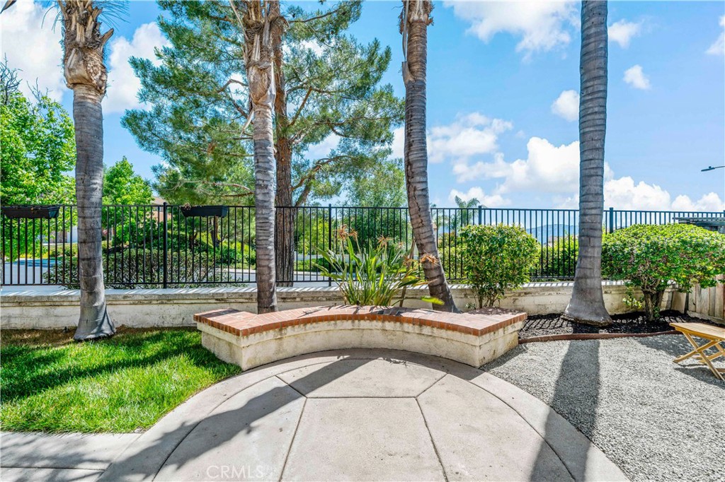 33307 Decada Street Temecula, CA 92592 - Photo 20 of 35 a view of a patio with couches and swimming pool