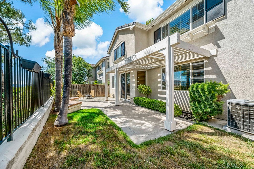 33307 Decada Street Temecula, CA 92592 - Photo 21 of 35 a view of a house with backyard and sitting area