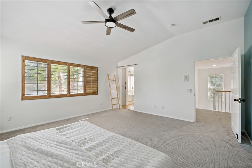 33307 Decada Street Temecula, CA 92592 - Photo 26 of 35 a view of a big room with windows and chandelier fan