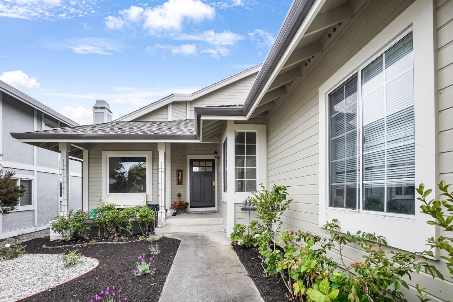 190 Cypress Point Road Half Moon Bay, CA 94019 - Photo 2 of 55 a front view of a house with a yard