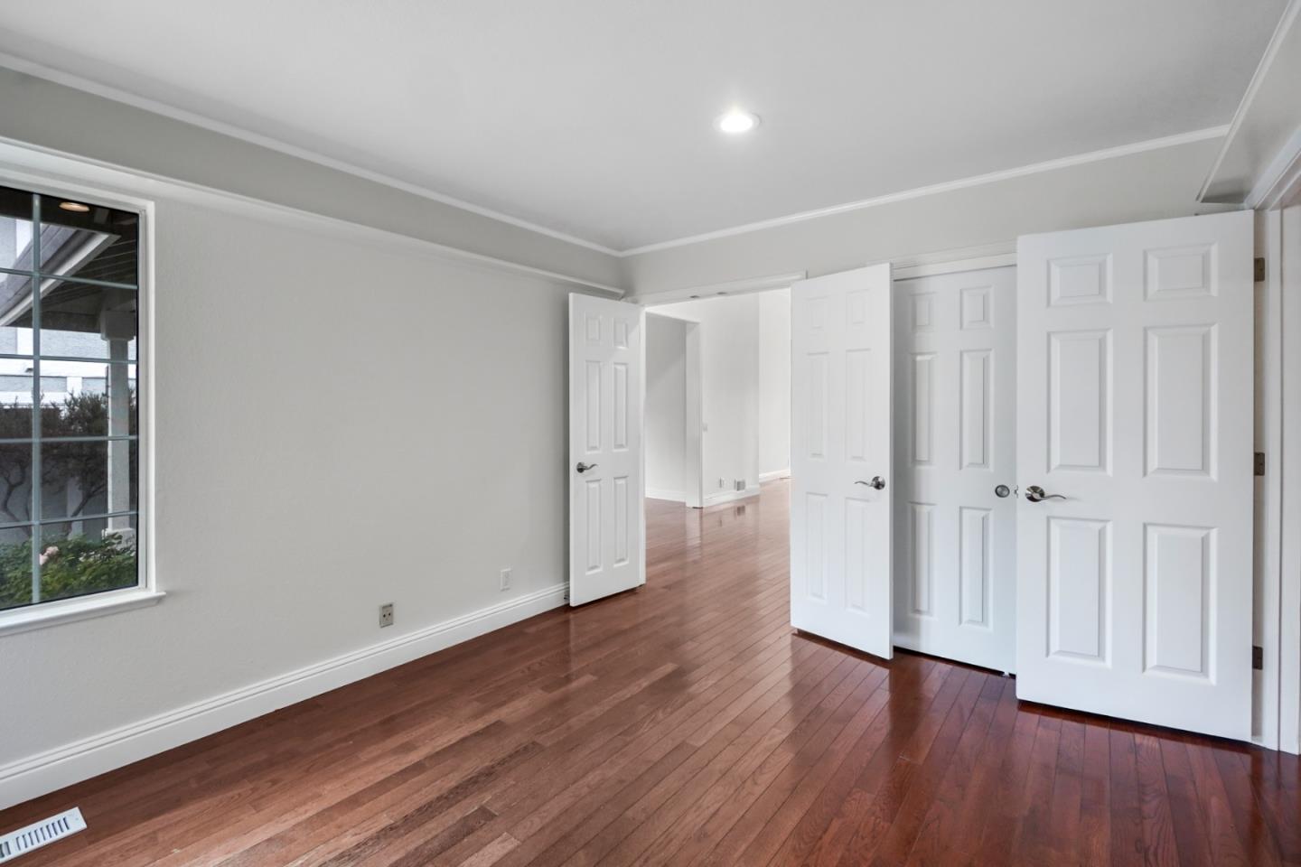 190 Cypress Point Road Half Moon Bay, CA 94019 - Photo 24 of 55 a view of a room with wooden floor and window