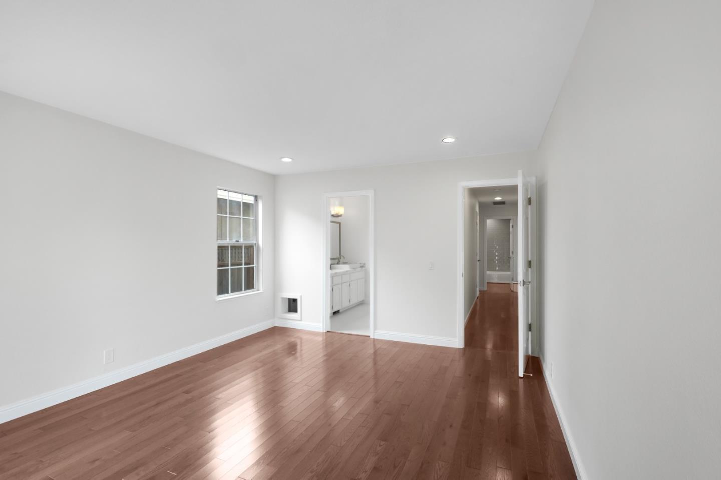 190 Cypress Point Road Half Moon Bay, CA 94019 - Photo 32 of 55 a view of a livingroom with wooden floor and a window