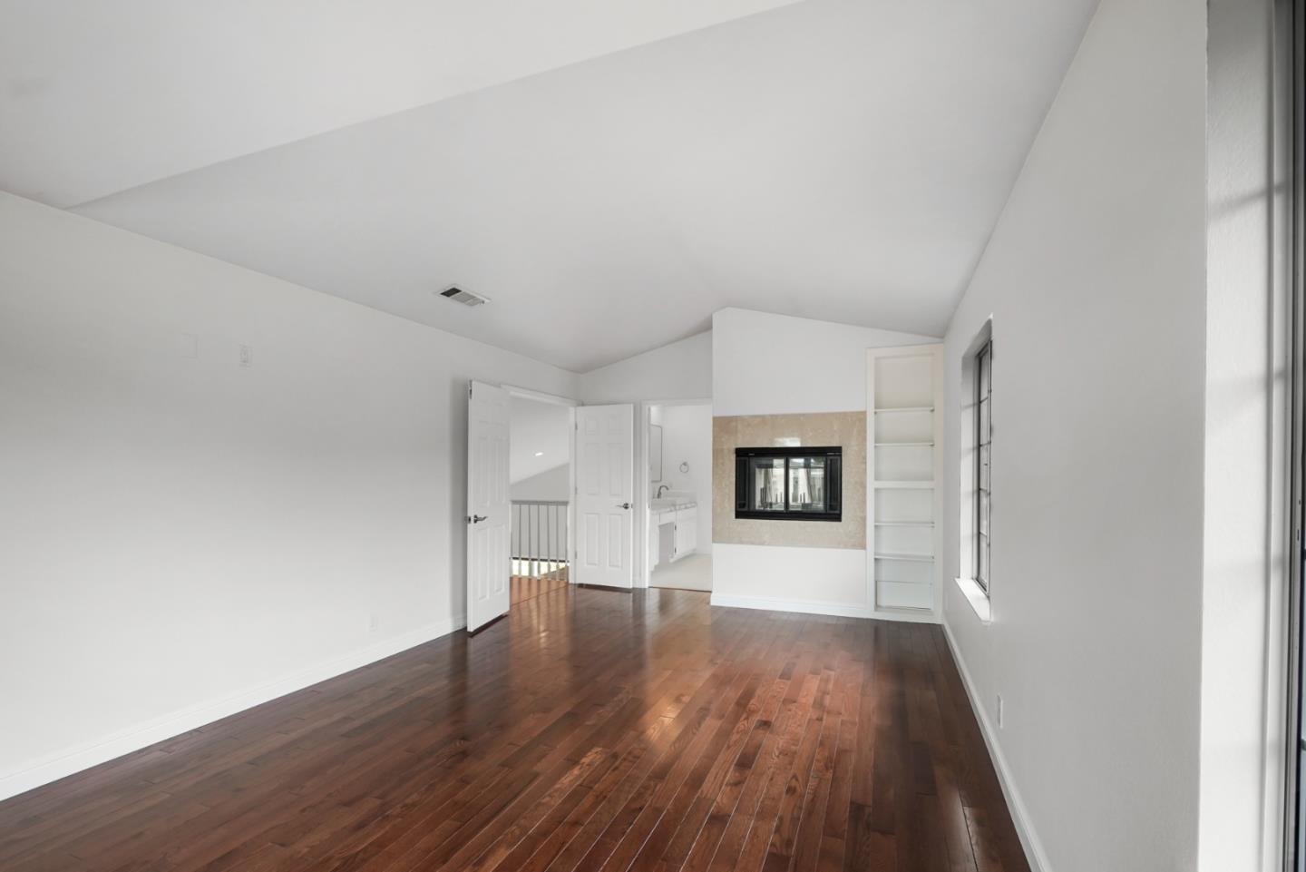 190 Cypress Point Road Half Moon Bay, CA 94019 - Photo 40 of 55 a view of a big room with wooden floor and windows