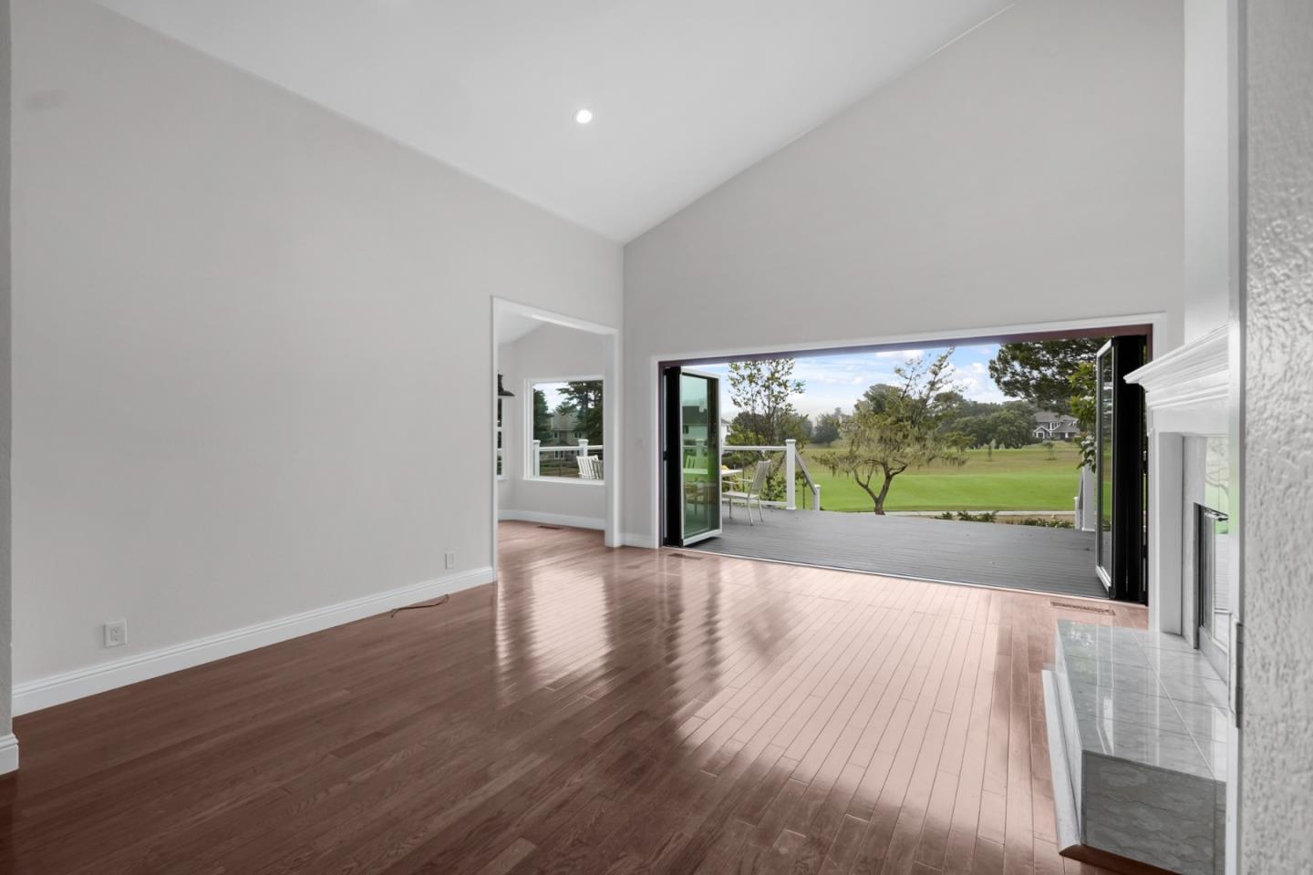 190 Cypress Point Road Half Moon Bay, CA 94019 - Photo 5 of 55 wooden floor in an empty room with a window