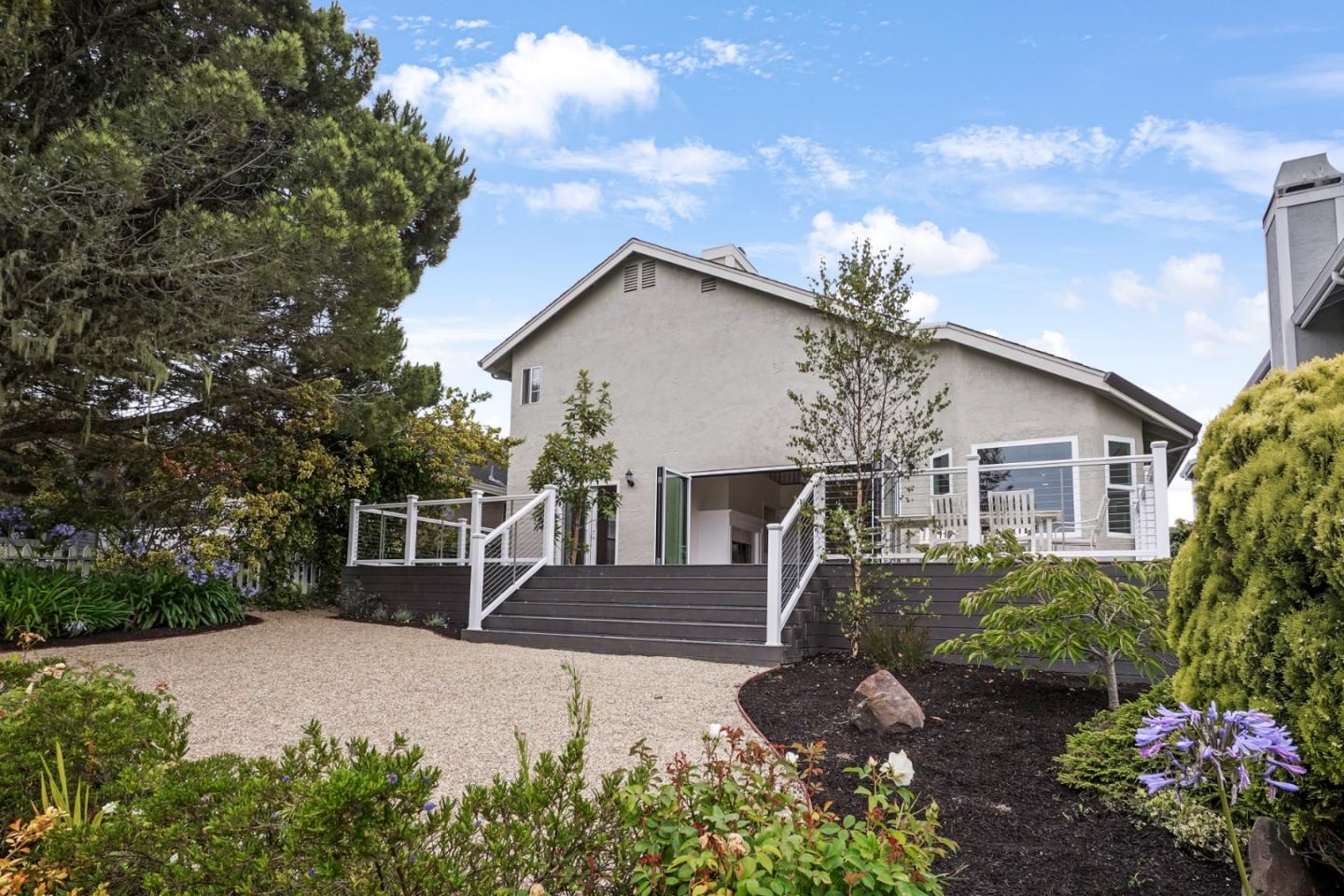 190 Cypress Point Road Half Moon Bay, CA 94019 - Photo 10 of 55 a house with trees in the background