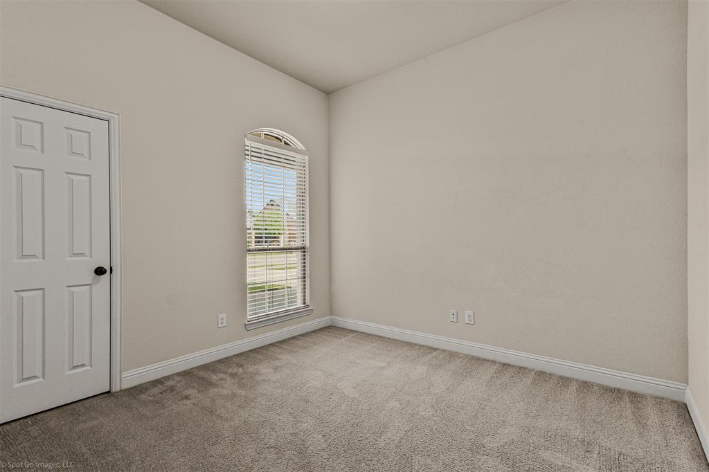 144 Birdsong Lane Terrell, TX 75160 - Photo 19 of 28 an empty room with windows and closet