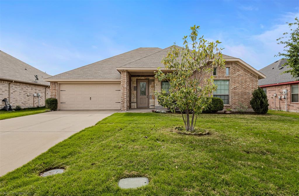 144 Birdsong Lane Terrell, TX 75160 - Photo 4 of 28 a house view with a garden space