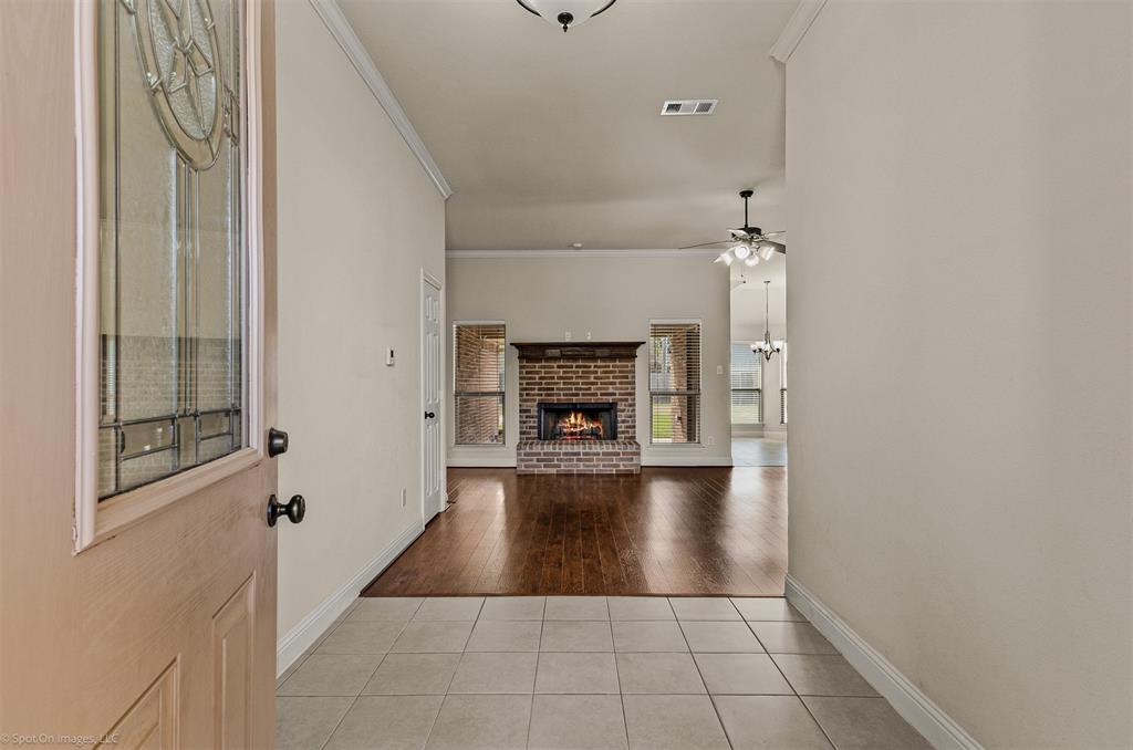 144 Birdsong Lane Terrell, TX 75160 - Photo 5 of 28 a view of a livingroom with a fireplace