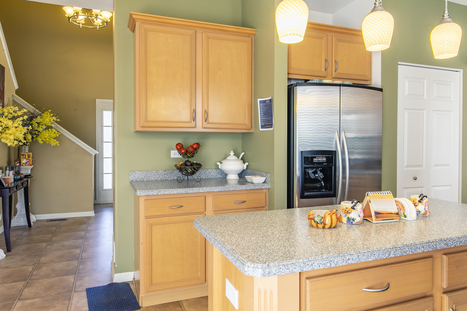 768 North Overlook Trail Round Lake, IL 60073 - Photo 15 of 34 a kitchen with stainless steel appliances granite countertop a sink and a refrigerator