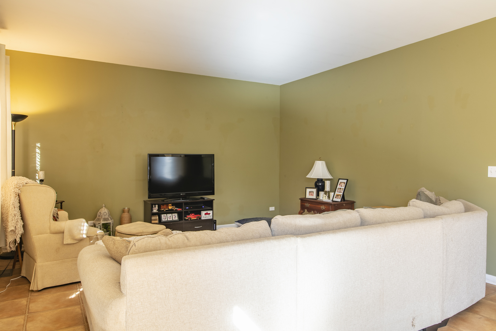 768 North Overlook Trail Round Lake, IL 60073 - Photo 18 of 34 a room with a bed and a flat screen tv