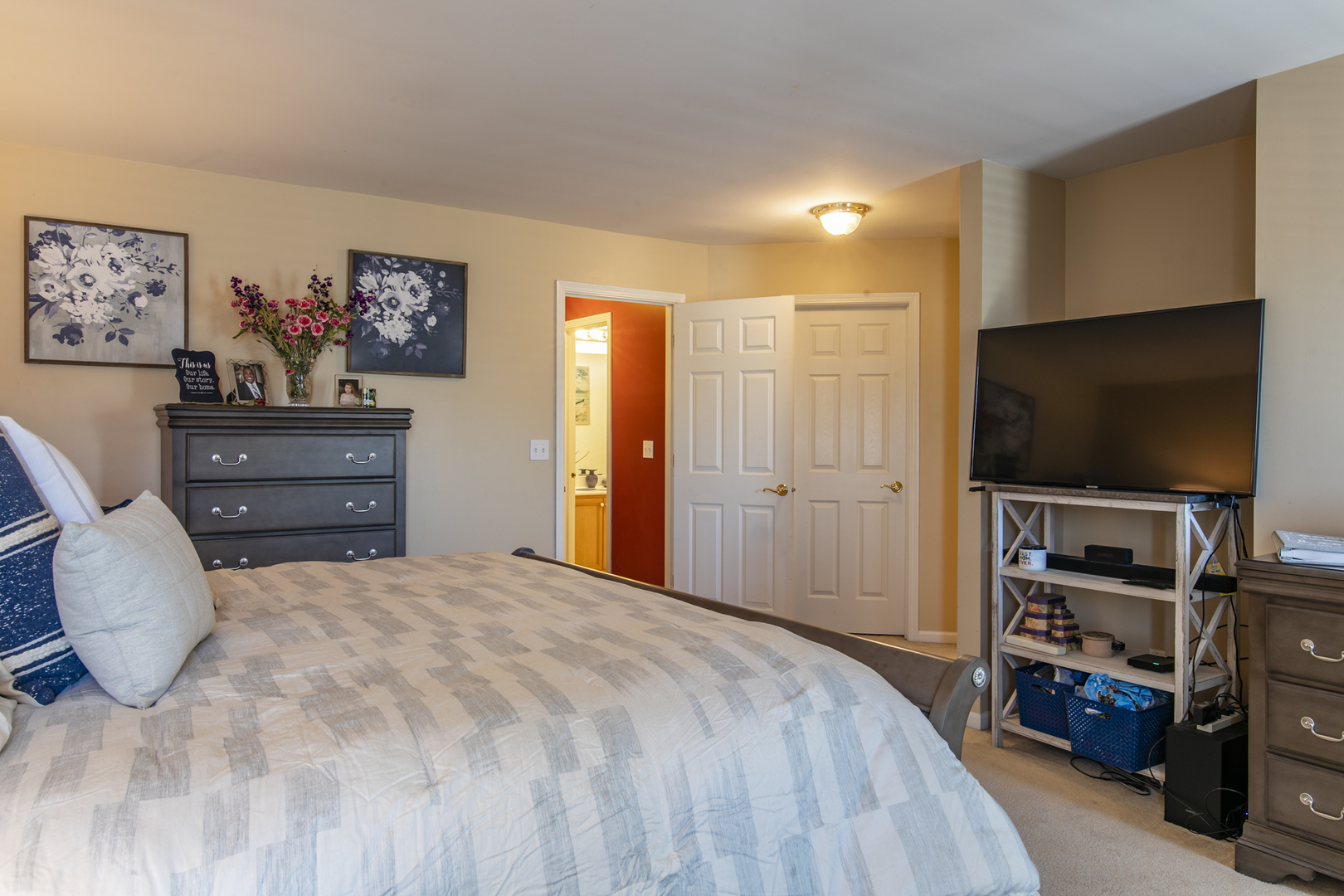 768 North Overlook Trail Round Lake, IL 60073 - Photo 24 of 34 a bedroom with a bed and a flat screen tv
