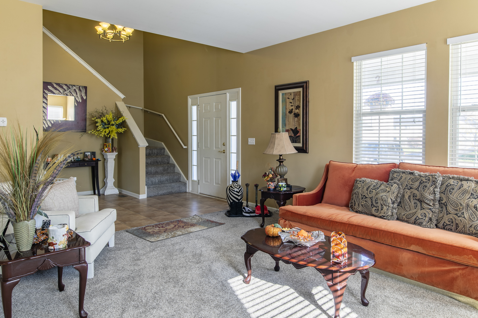 768 North Overlook Trail Round Lake, IL 60073 - Photo 9 of 34 a living room with furniture and a potted plant