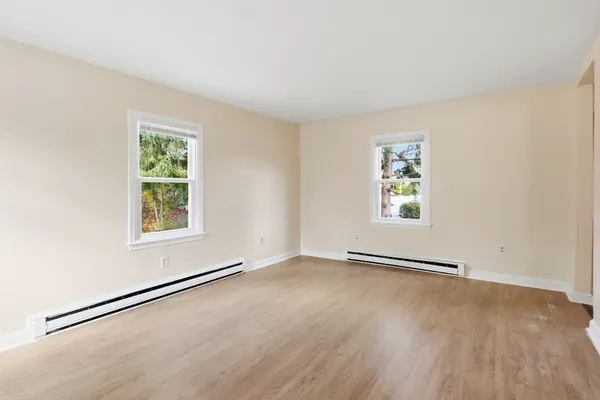 an empty room with windows