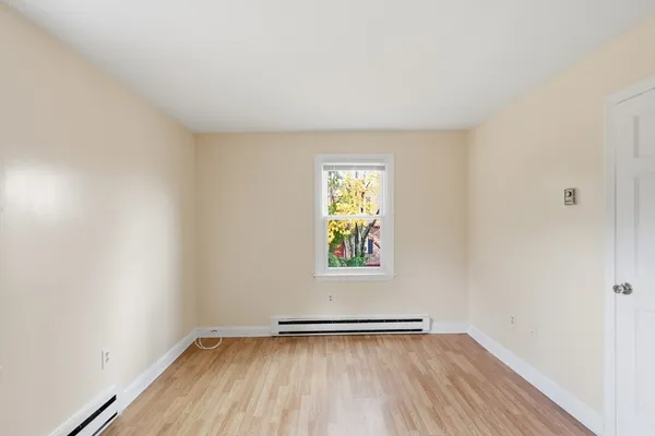 an empty room with window