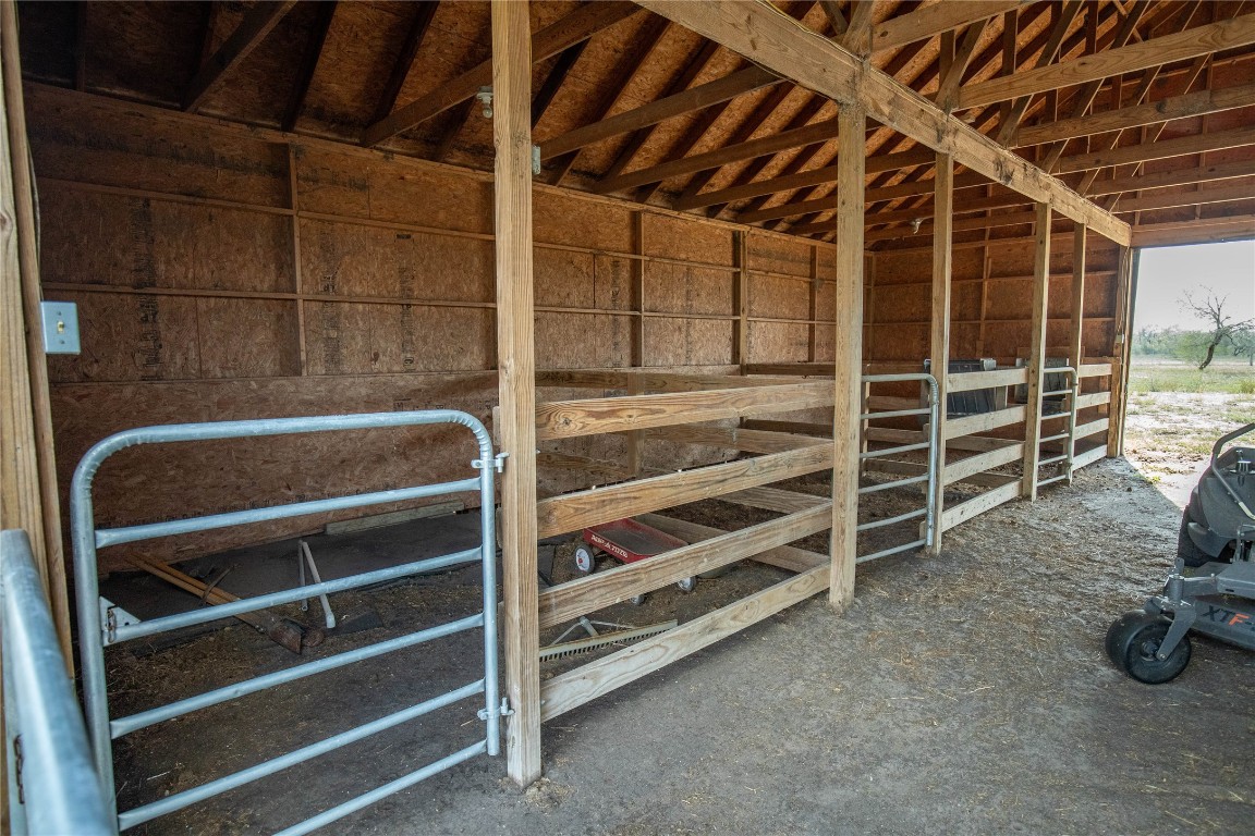 698 Hilbrich Road Westhoff, TX 77994 - Photo 16 of 40 a view of an empty room with empty shelves