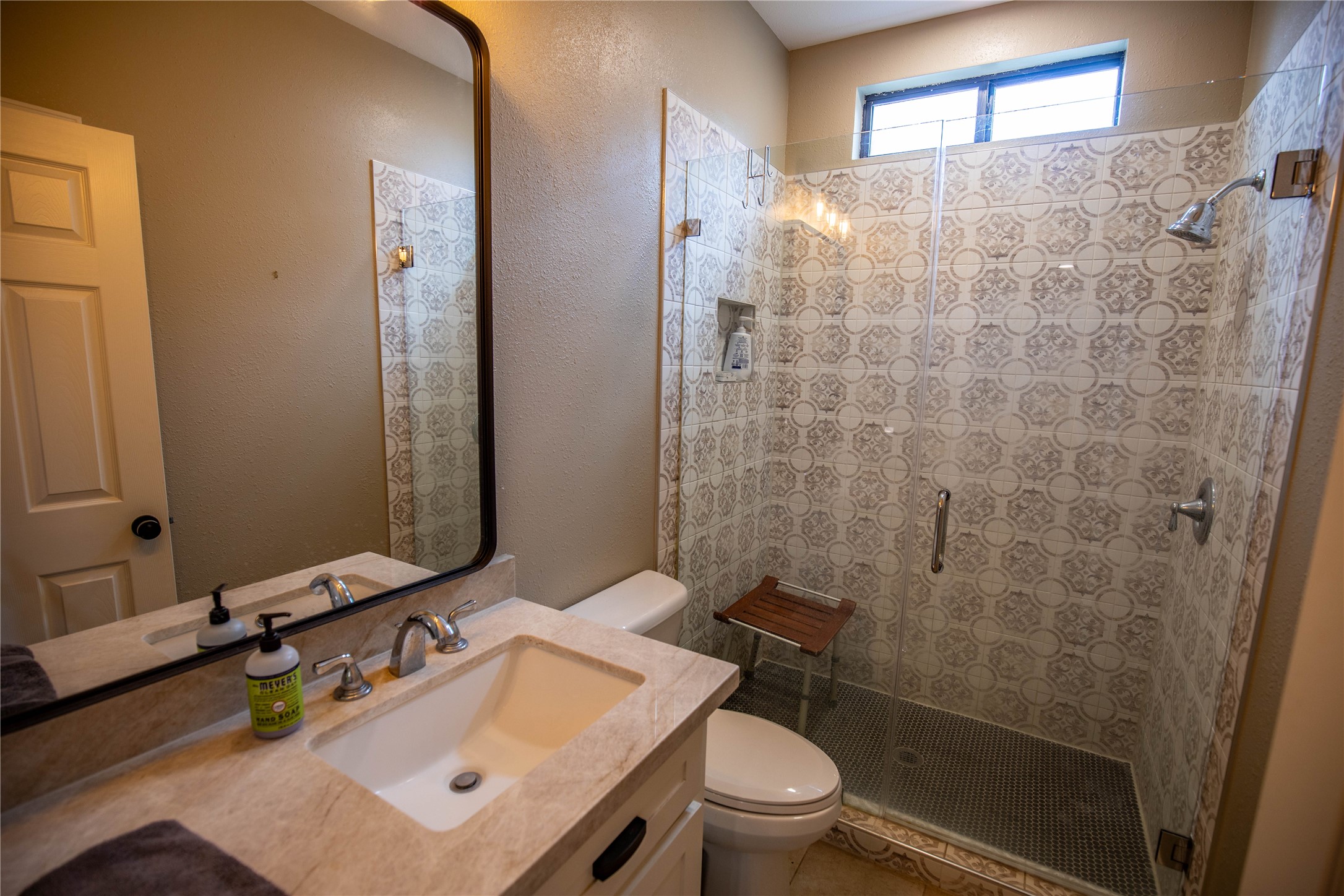 698 Hilbrich Road Westhoff, TX 77994 - Photo 28 of 40 a bathroom with a sink toilet and shower