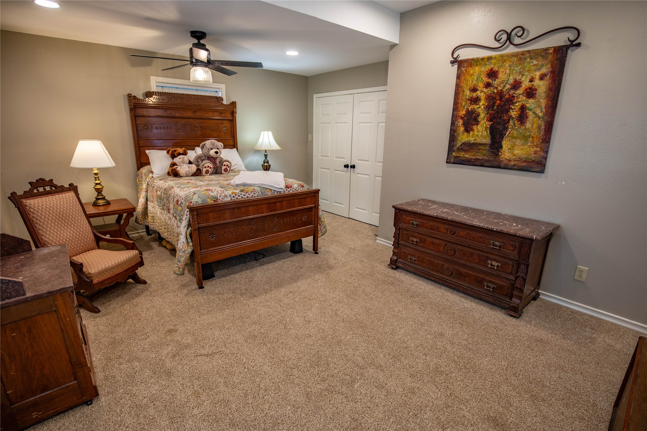 698 Hilbrich Road Westhoff, TX 77994 - Photo 29 of 40 a bedroom with furniture and a lamp