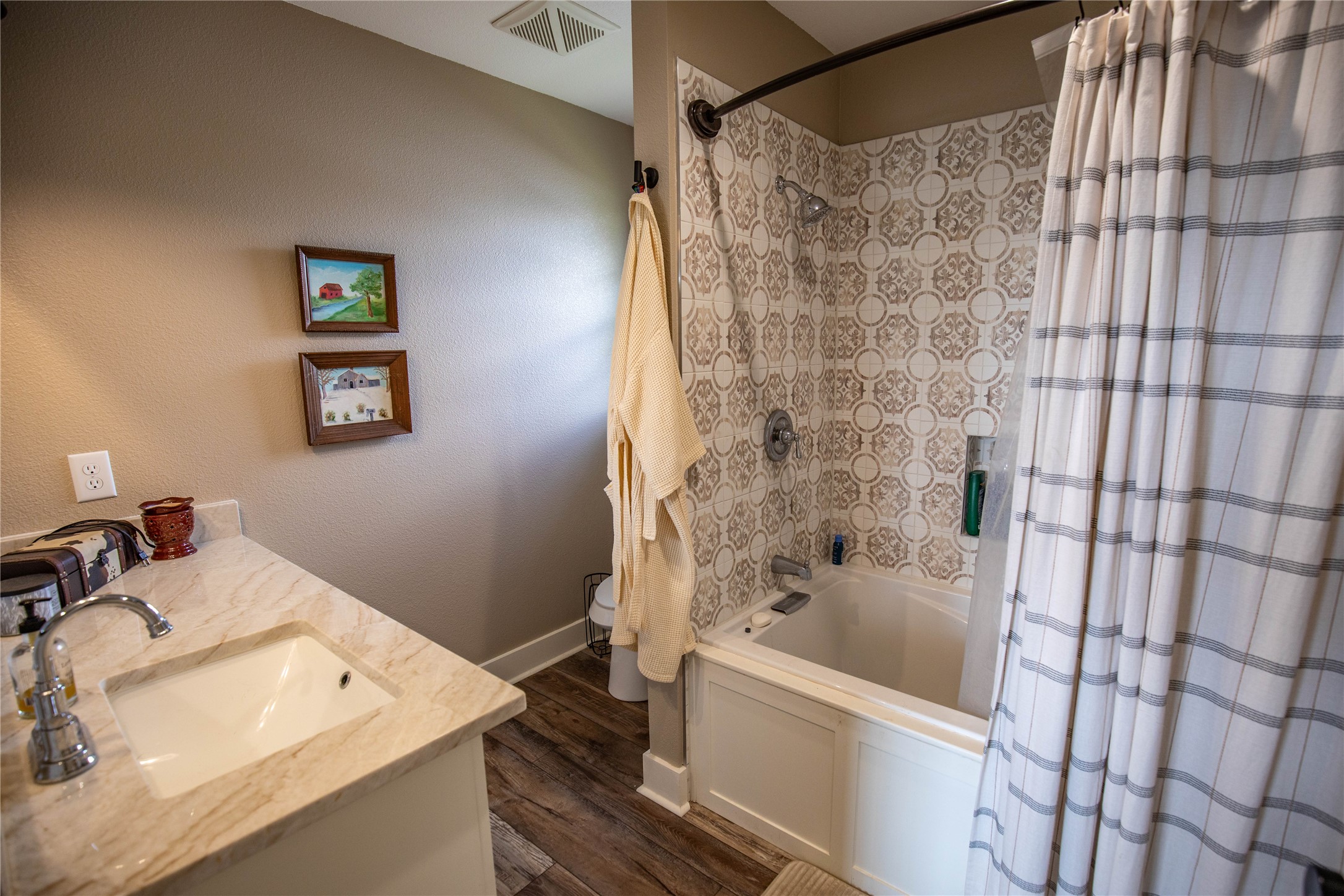 698 Hilbrich Road Westhoff, TX 77994 - Photo 32 of 40 a bathroom with a sink and a bathtub