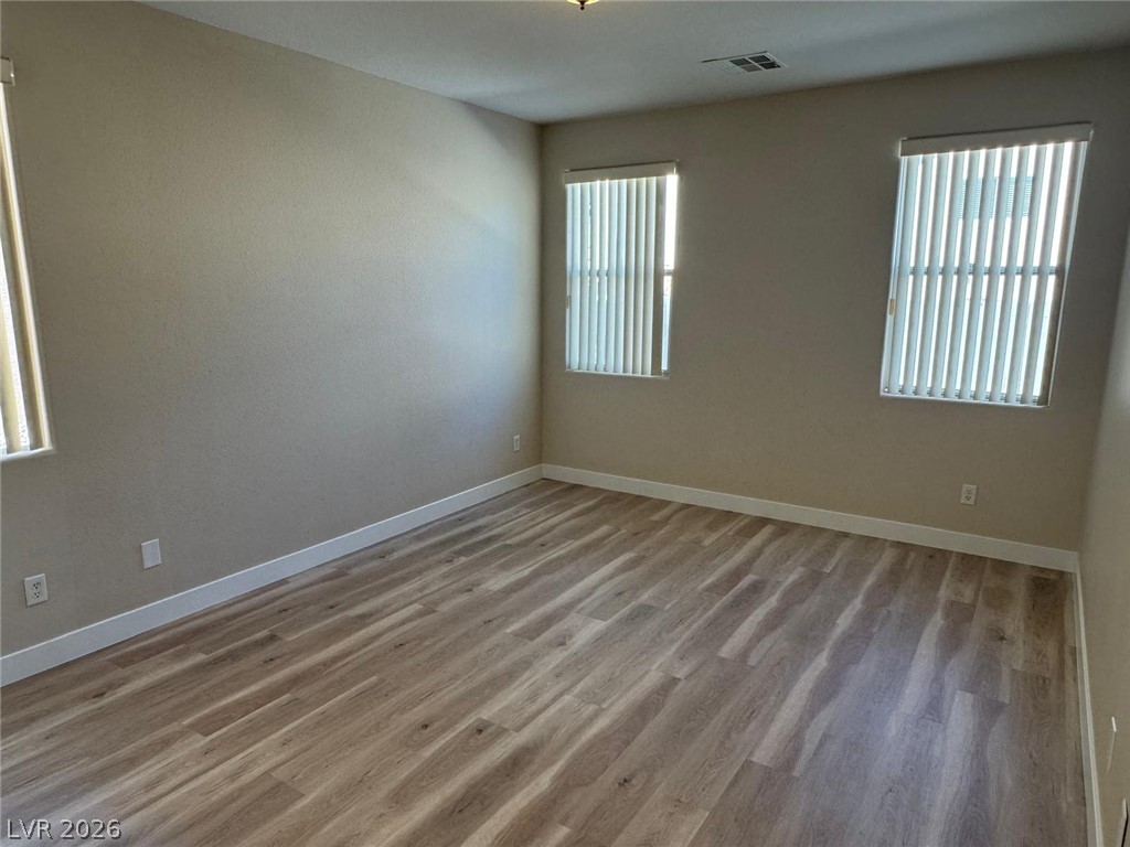3962 Coyote Ridge Court Las Vegas, NV 89129 - Photo 14 of 35 A quiet space with neutral tones, perfect for creating a personalized retreat.