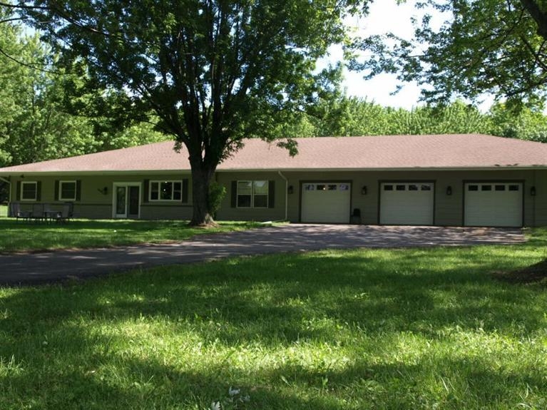 446 West Division Road Valparaiso, IN 46385 - Photo 1 of 10 a front view of a house with a yard