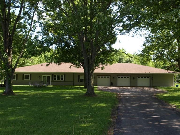 446 West Division Road Valparaiso, IN 46385 - Photo 2 of 10 a front view of a house with garden