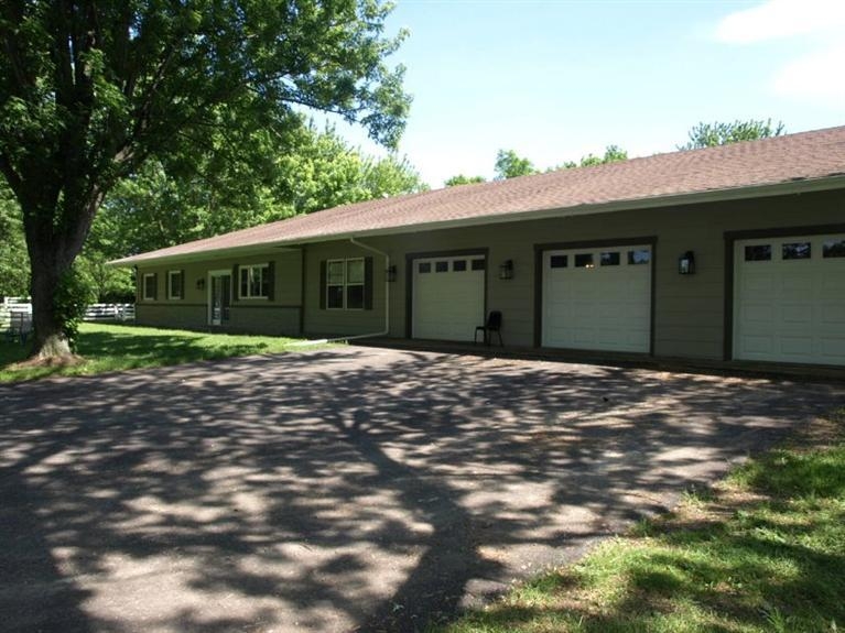 446 West Division Road Valparaiso, IN 46385 - Photo 3 of 10 a front view of a house with a garden