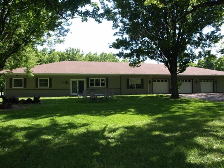 446 West Division Road Valparaiso, IN 46385 - Photo 4 of 10 a front view of a house with a garden
