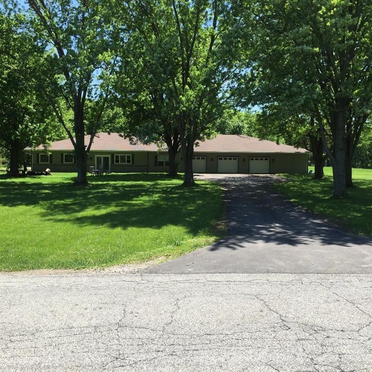446 West Division Road Valparaiso, IN 46385 - Photo 7 of 10 a front view of a house with a yard