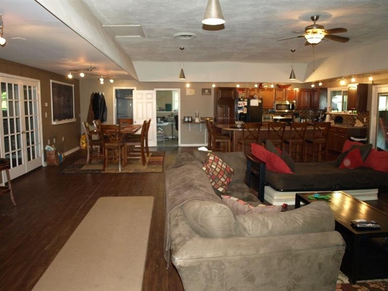 446 West Division Road Valparaiso, IN 46385 - Photo 8 of 10 a living room with lots of chairs and chandelier