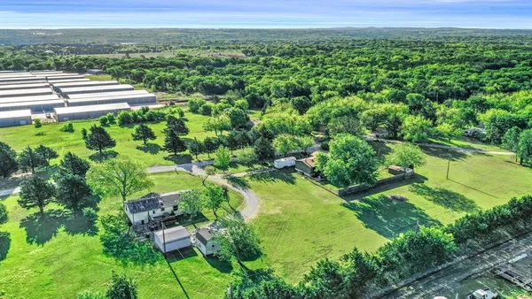 a view of a garden with an ocean